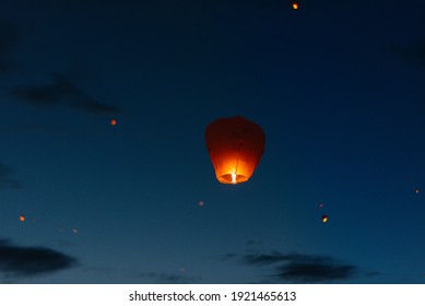 In the evening, at sunset, people with their relatives and friends launch traditional lanterns. Tradition and travel - Powered by Shutterstock