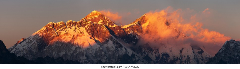 Evening sunset red colored view of Everest and Lhotse with beautiful clouds from Kongde village, Khumbu valley, Solukhumbu, Nepal Himalayas mountains