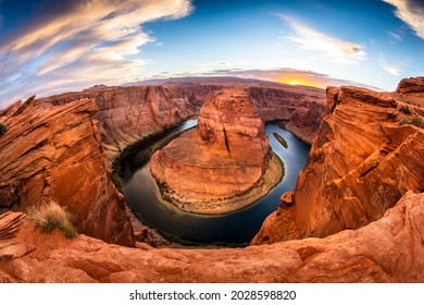 An evening sunset shot of Horseshoe Bend -- a horseshoe shaped canyon high above the Colorado River near Lake Powell and the Grand Canyon. - Powered by Shutterstock