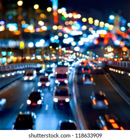 Evening traffic. The city lights. Motion blur. Abstract background.