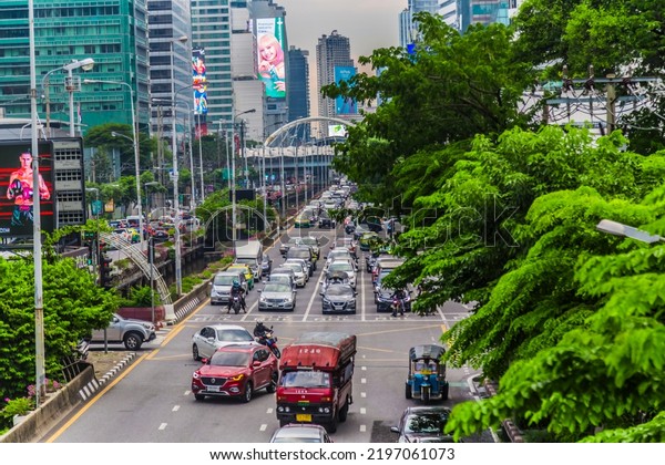Evening traffic on the main road in the heart of\
Bangkok in the rainy season Pictured here is Sathorn Road, Bangkok,\
Thailand, September 1,\
2022.