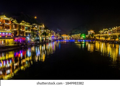 Evening View Of Fenghuang Ancient Town With Tuo River, Hunan Province, China