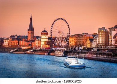 The Evening View of the Rhine River and the Old Town of Dusseldorf, Germany - Powered by Shutterstock