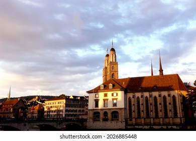 The Evening View Of Grossmünster, A Romanesque-style Protestant Church In Zürich, Switzerland