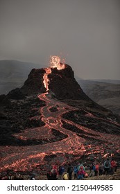 A Evening View Of The Volcano Eruption In Iceland  People Are Watching The Fiery River