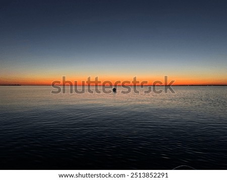 Evening water structure, waves, current, ripples, glare. Beautiful background. After sunset.