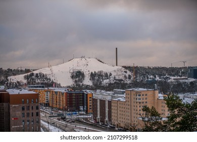Evening winter view of the ski slope Hammarbybacken in central Stockholm a snowy winter day in Stockholm, Sweden 2022-01-09