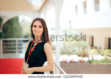 Event Planner Coordinator PR Specialist Employee at Formal Event 
Authorized manager wearing a badge welcoming guests at hotel entrance
