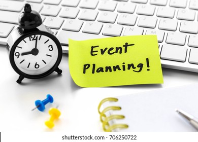 Event Planning Word On Notepad With Clock On White Computer Desk