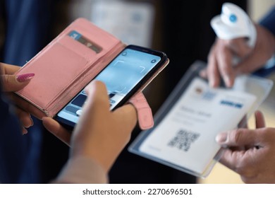 Event QR code ticket scanning. Businessman registering for a business conference using his smart phone