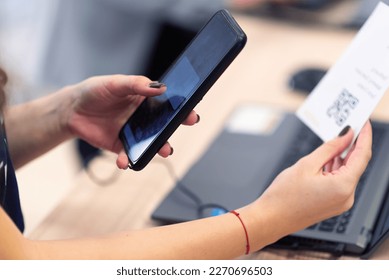 Event QR code ticket scanning. Businessman registering for a business conference using his smart phone - Powered by Shutterstock - Get 15% off with code: PIKWIZARD15