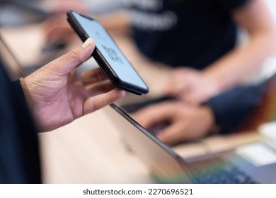 Event QR code ticket scanning. Businessman registering for a business conference using his smart phone - Powered by Shutterstock - Get 15% off with code: PIKWIZARD15