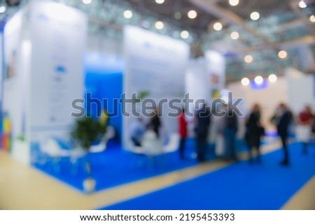 Event trade show expo background- bokeh lights. Expo business- booth stand