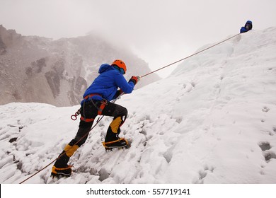 EVEREST BASE CAMP, KHUMBU NEPAL - APRIL 14, 2014: Unidentified Mt Everest Climber On Crampon Training In Khumbu Icefall, Mt Everest