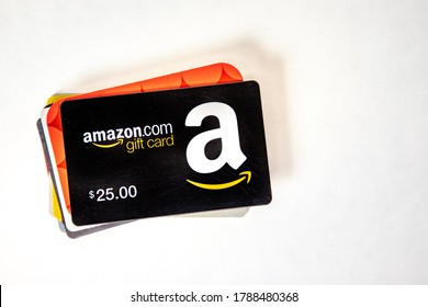 Everett, WA - USA / 07/29/2020: Amazon Gift Card On Stack Or Other Gift Cards