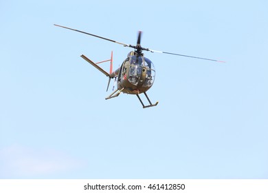 Everett, WA, USA - July 30, 2016: A Hughes OH-6 Cayuse Helicopter Was Seen Flying Over Everett Paine Field.