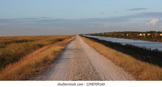 Everglades Conservation Levee Greenway Pathway at Sunset - Shutterstock ID 1298709160
