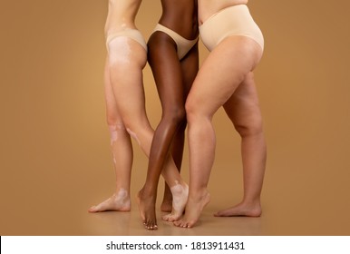 Every Body Is Beautiful. Tree women with different race and body sizes posing in underwear over beige background, cropped image with free space - Shutterstock ID 1813911431