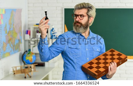 Every chess master was once beginner. Chess lesson. Strategy ideas. Teacher at tournament. Strategy concept. Management and leadership. Board game. Smart man playing chess. Intellectual hobby.