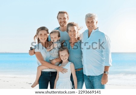 Every day with them is magical. Shot of a multi-generational family spending the day at the beach.