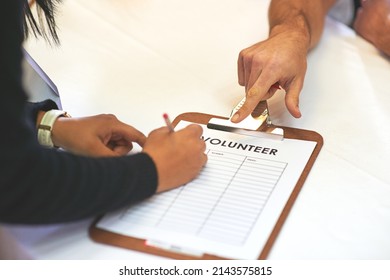 Every Little Bit Helps. Cropped Shot Of Volunteer Getting Signatures For Church Donations.