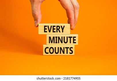Every minute counts symbol. Concept words Every minute counts on wooden blocks on a beautiful orange table orange background. Businessman hand. Business, motivational and every minute counts concept.