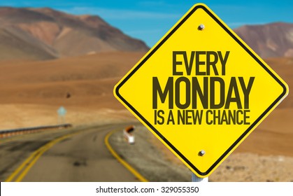 Every Monday Is A New Chance Sign On Desert Road