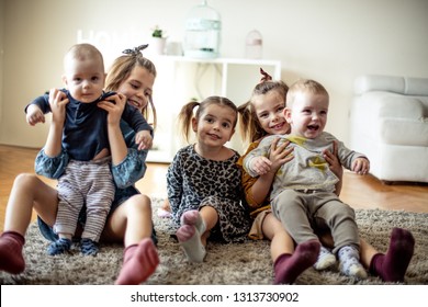 Everyone  Always Together. Group Of Children At Home.