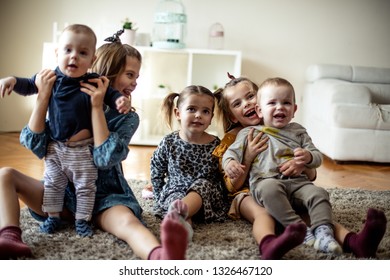 Everyone  Always Together. Group Of Children At Home.