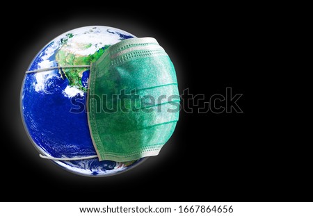 Everyone in the world need protection from Covic 19 or Corona virus pestilence concept, Earth with green medical or hygienic mask on Dark background, Elements of this image furnished by NASA