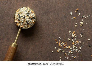 Everything Bagel Seasoning Spilled from a Teaspoon - Shutterstock ID 2161869157