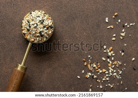 Everything Bagel Seasoning Spilled from a Teaspoon