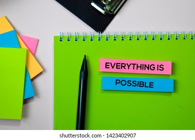 Everything is Possible text on sticky notes with office desk concept
