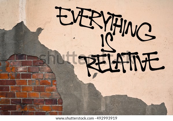 Everything Is Relative - Handwritten graffiti sprayed on the wall, anarchist aesthetics. Postmodern relativization of morality, ethics, values. Everything is personal arbitrary opinion