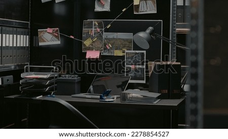 Evidence room office with detective board and desk, crime scene photos and case files on walls. Empty police inspector archive space with crime suspects, witness statements and sticky notes.