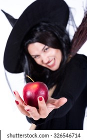 Evil Beautiful Witch With Red Apple