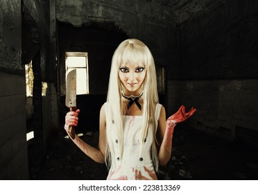 Evil Smiling Woman In The Style Of Doll  Killer, Zombie Or A Ghost With A Bloody Hatchet In Hand