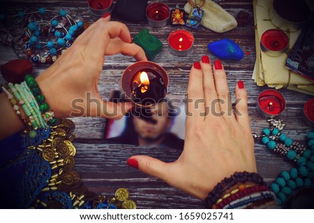 Evil spells and witchcraft. Magic to cause harm to humans. Deadly conspiracy and ritual. Occultism and magic. Ceremonies on the photo. Dangerous sorcerers charlatans.