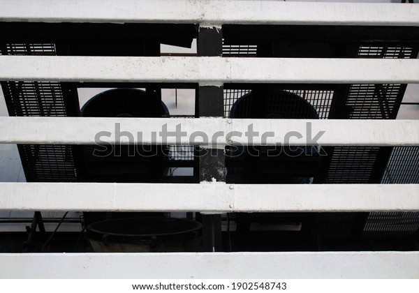 evocative\
image of the fumes exhaust points of a ferry\
