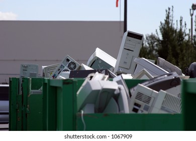 e-Waste (old computers and electronics) being recycled - Shutterstock ID 1067909