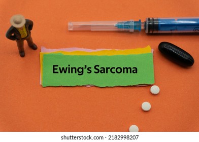 Ewing's Sarcoma.The Word Is Written On A Slip Of Colored Paper. Health Terms, Health Care Words, Medical Terminology. Wellness Buzzwords. Disease Acronyms.