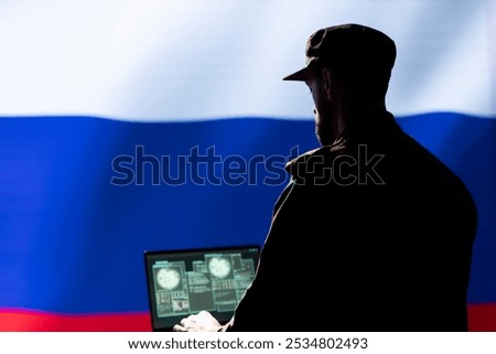 Ex KGB soviet agent combating organized crime and terrorism using detection system on laptop. Russia FSB officer protecting national sovereignty by tracking Chechen separatist terrorist