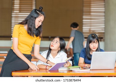 Exam Prep. Group Of Asian Student Friends Studying Together Preparing For Exams In College University.