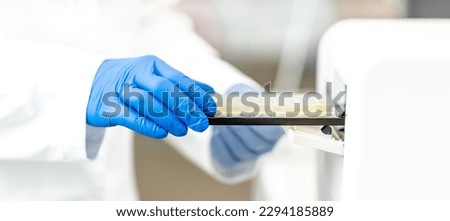 examination of a chemical sample using modern devices in the biochemical laboratory of the research institute