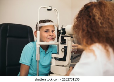 Examination Of A Child With A Slit Lamp, Microscope And Focused Light Source. Device For High-precision Examination Of The Eye To Determine The Condition Of The Lens, The Cornea.