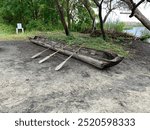 Example of a hollowed out tree used as a canoe by native Americans in the United States