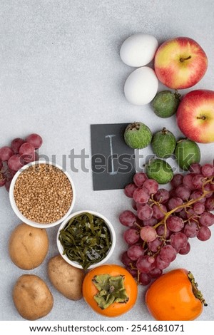 Example of a range of food products containing iodine, I. The concept of a proper balanced diet. Top view, free space.