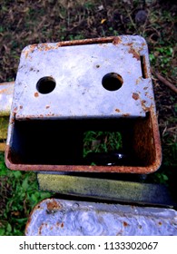 Example of   See Faces in Inanimate Objects, sample with the top of a steel gate