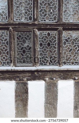 An example of traditional Tudor window construction above an example of Wattle and Daub technique