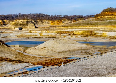 Excavation Site, Mounds, A Pond With Blue Water In The Old Marl Quarry Mine In Sint-Pietersberg Or Mount St. Peter, Part Of The Caestert Plateau In South Limburg, The Netherlands